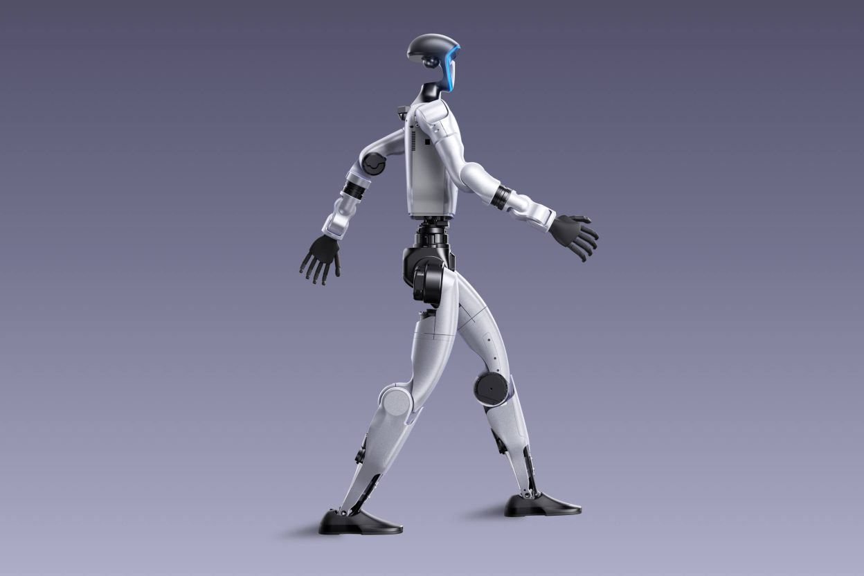 Robot humanoïde Unitree G1 en position de marche, avec structure articulée bipède et bras étendus